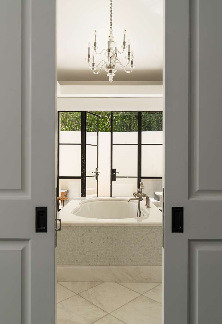 Grand bathroom with outdoor access
