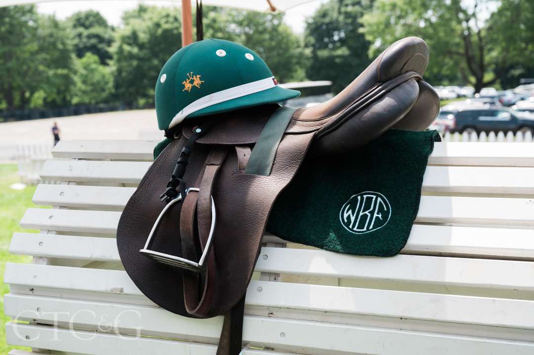 Polo saddle and helmet at CTC&G Players' Lounge at Greenwich Polo Club