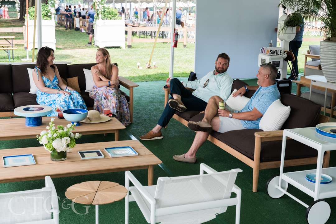 Guests relaxing at CTC&G Players' Lounge at Greenwich Polo Club