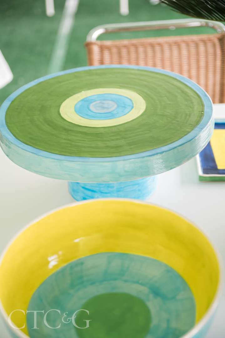 Green, blue and yellow table decorations at CTC&G Players' Lounge at Greenwich Polo Club