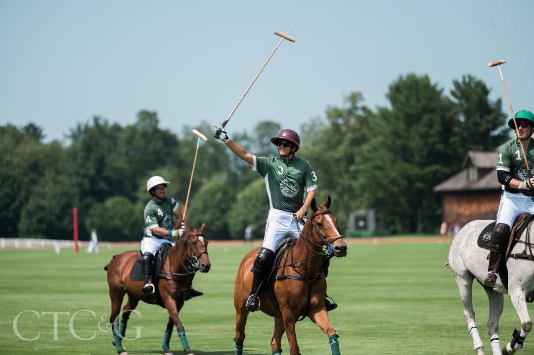 Polo players and horses at Greenwich Polo Club