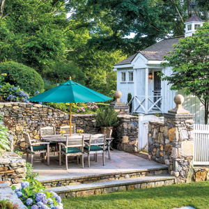 A Series of Terraces and Russell Page-Inspired Landscaping Perform Magic at a Steep One-Acre Property Along the Shepaug River