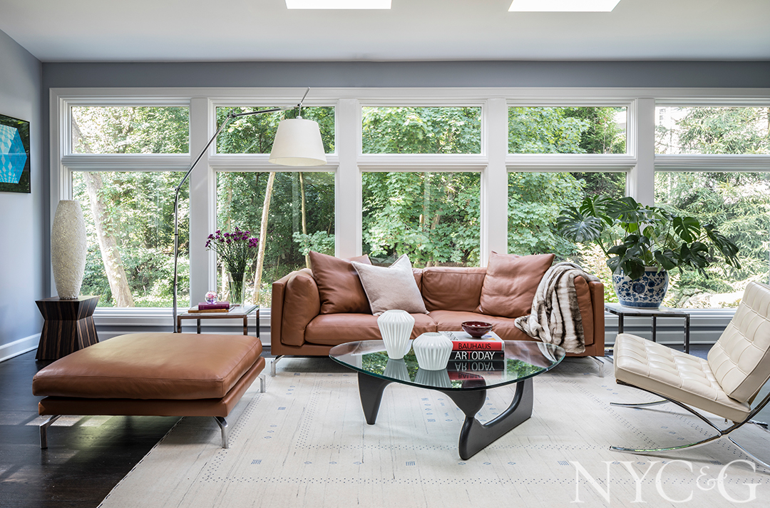 Luxurious sunroom with a variety of furniture