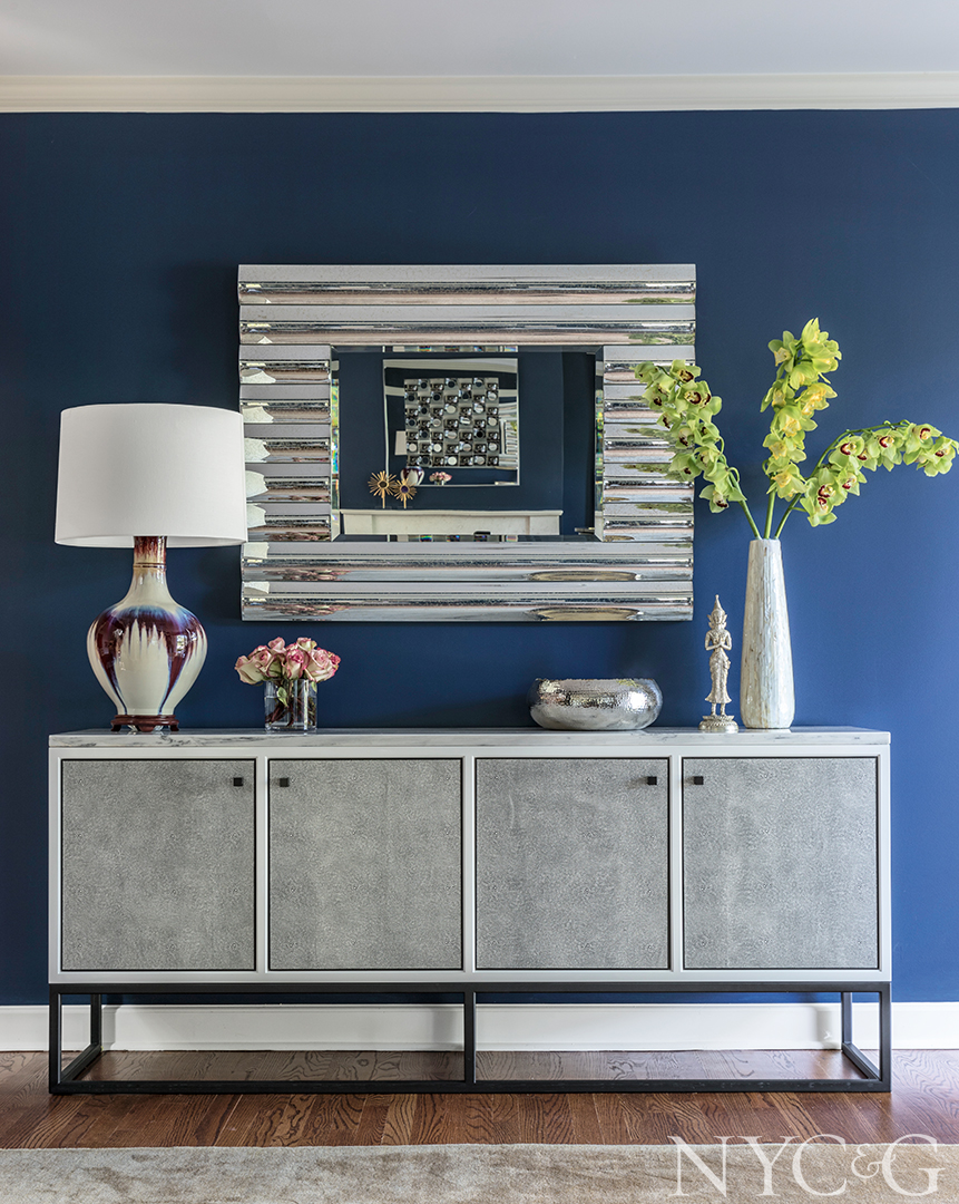 Vintage mirror decorates entryway