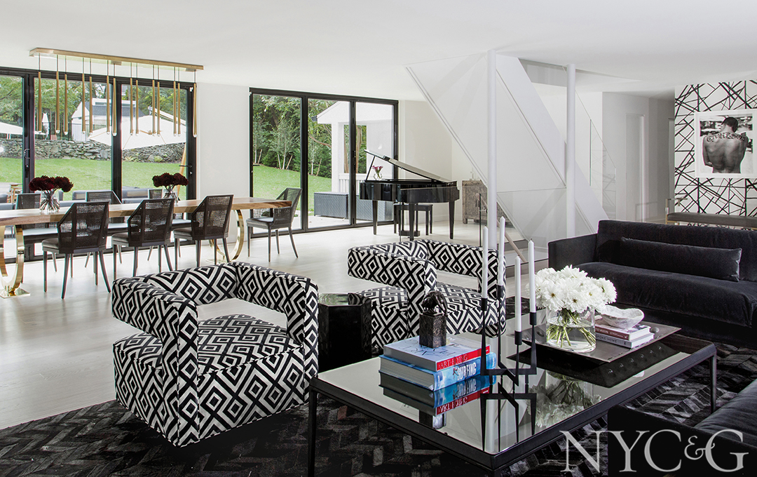 A velvet-covered sectional and Nico swivel chairs decorate the living room