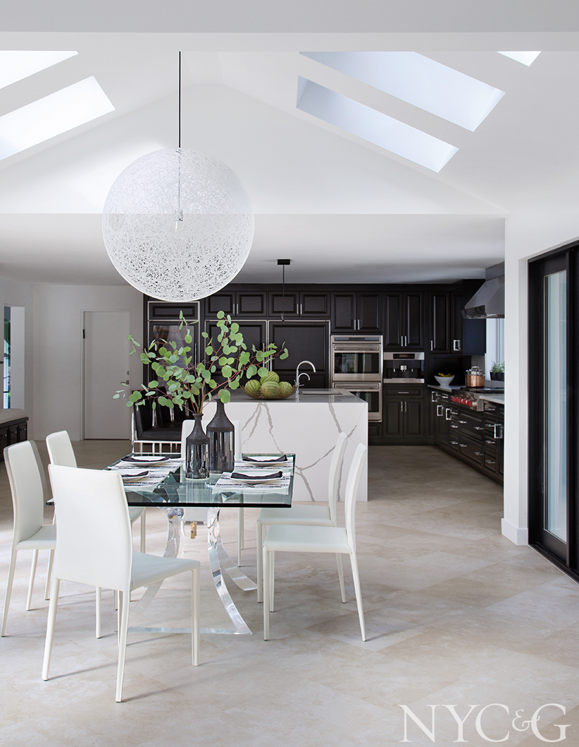 Leather-covered chairs enrich the dining area layout