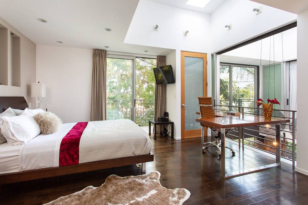 Master bedroom overlooking living area