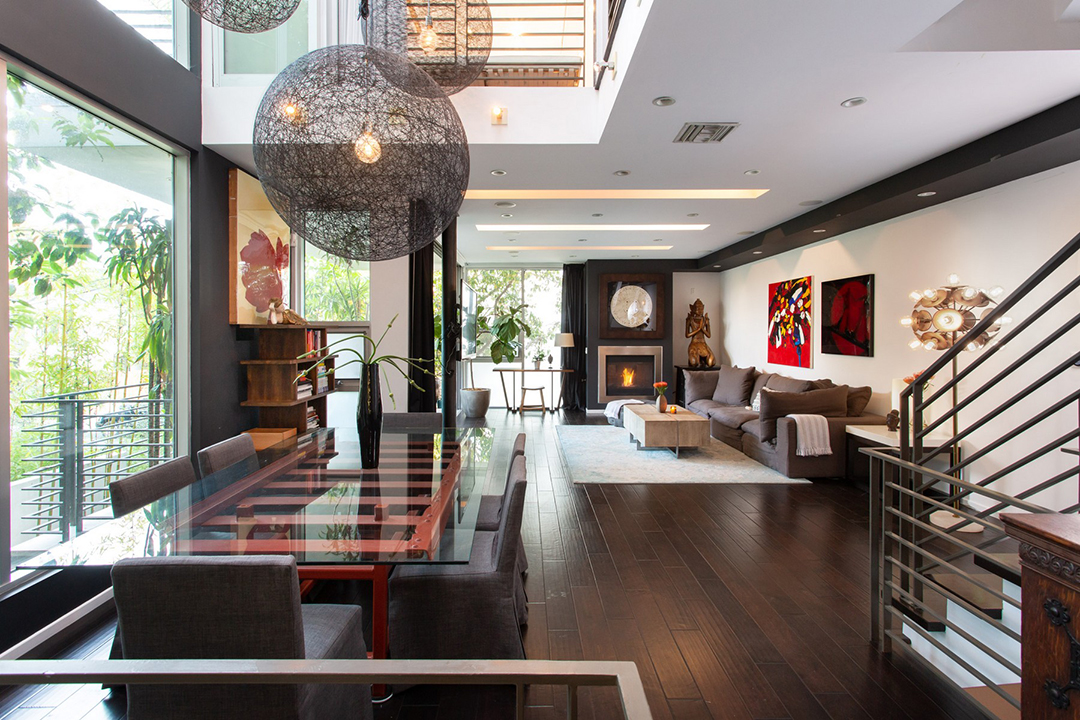 Dining area that leads to a living room in an airy LA home