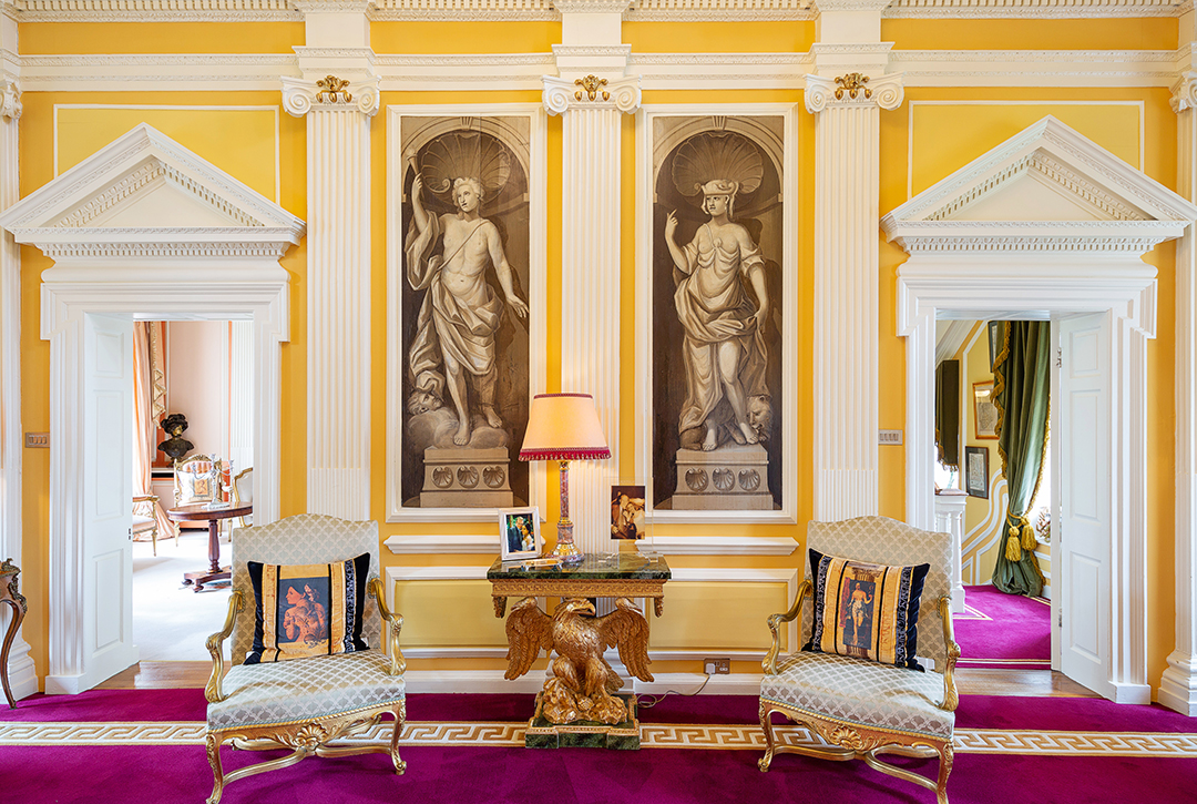 Art and moldings in a grand room