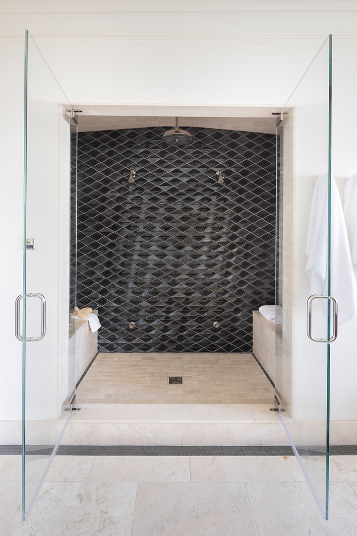 Master suite shower with gray tiles