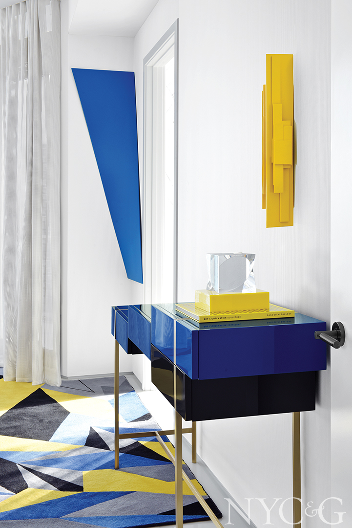 blue sculpture and contemporary console