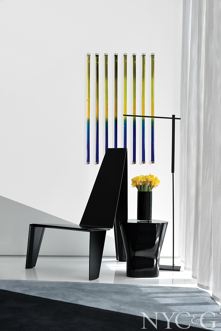 black chair and side table with contemporary artwork