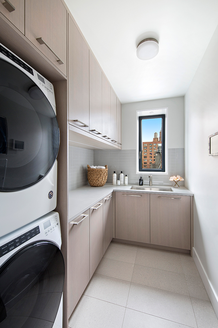 Laundry room at a boutique luxury building in Chelsea, 124 West 16th Street