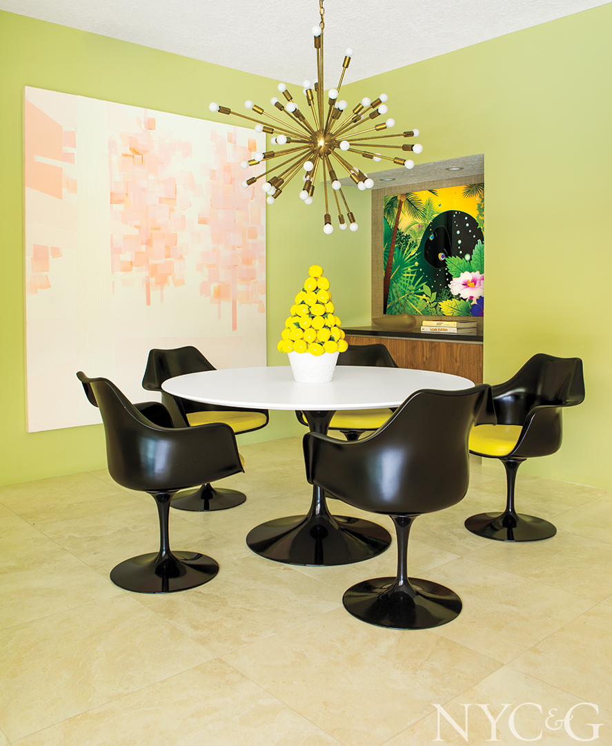 Dining area with accent black chairs.