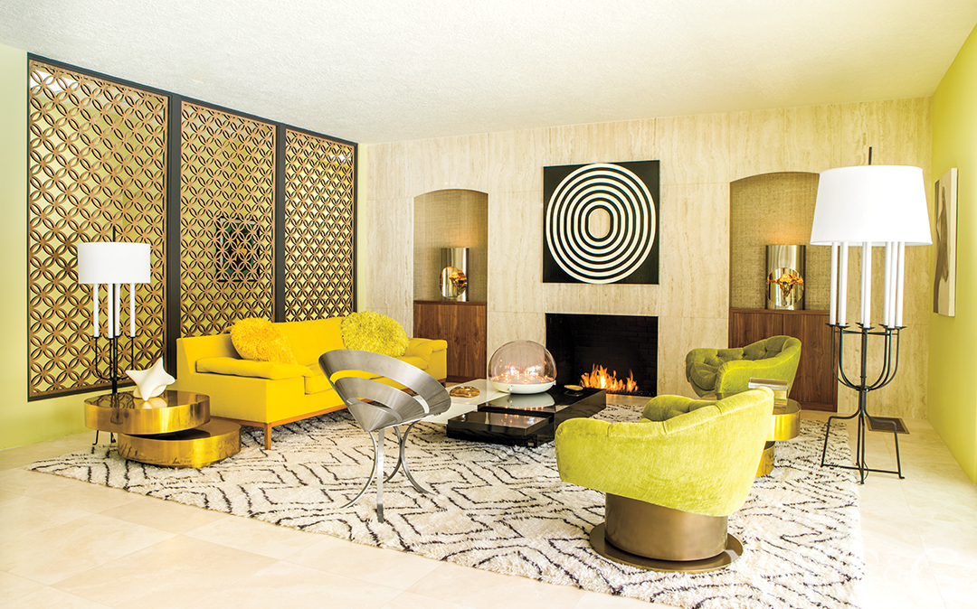 Sitting area with natural light and fireplace.