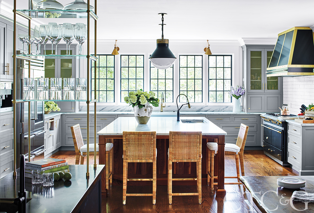 View of the kitchen with lots of natural light and earthy tones.