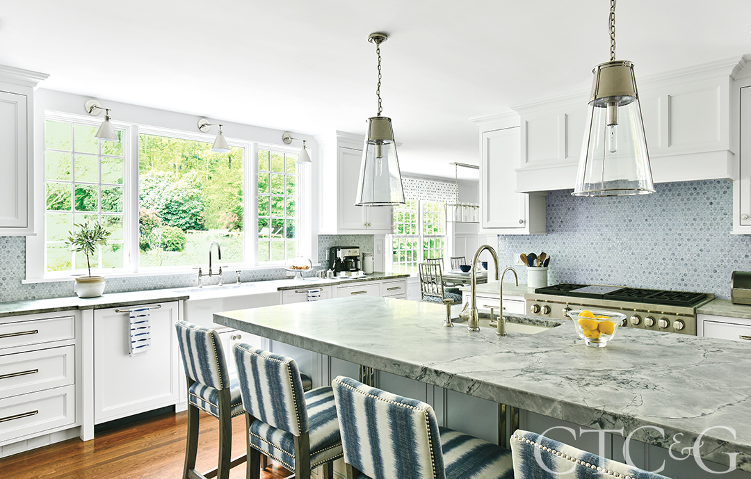 Kitchen Island with barstools and lots of coastal colors.