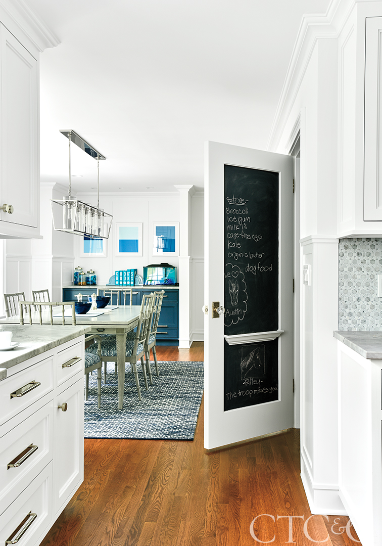 View of the breakfast room and chalkboard pantry.