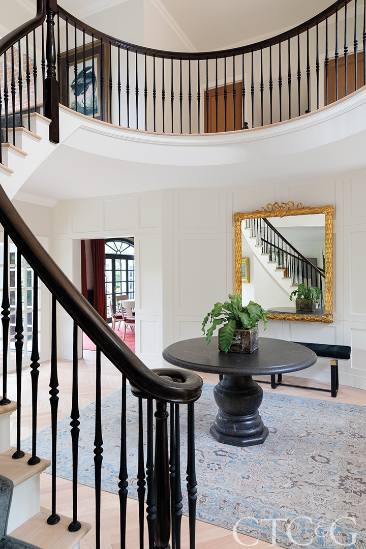 foyer with mirror and center table