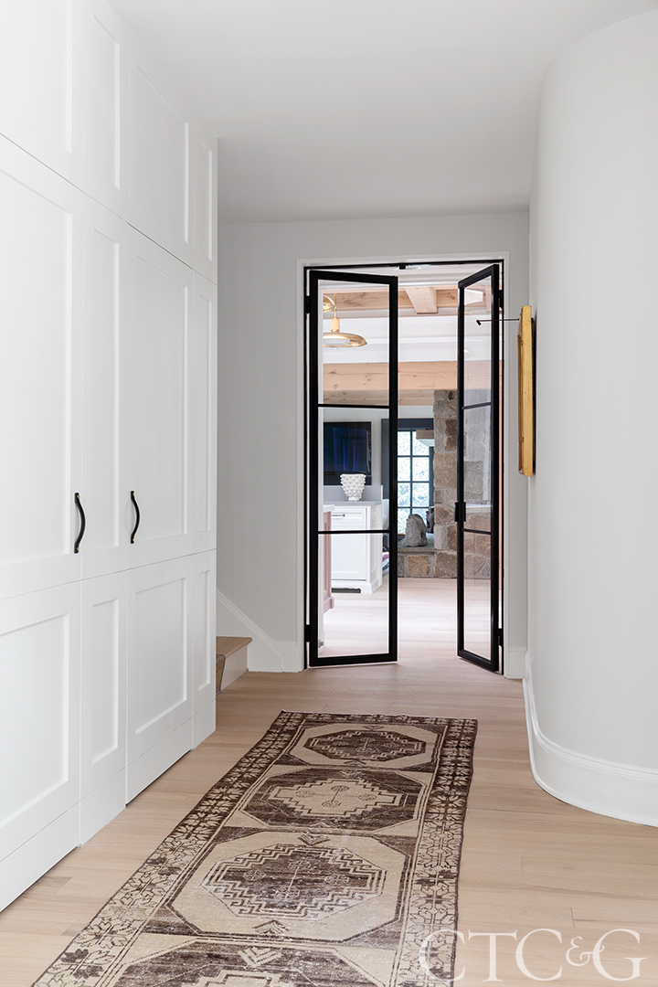 hallway with antique rug