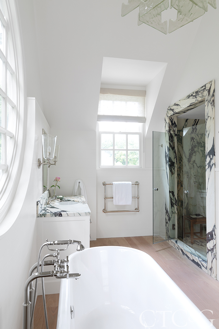 white bathroom with marble accents