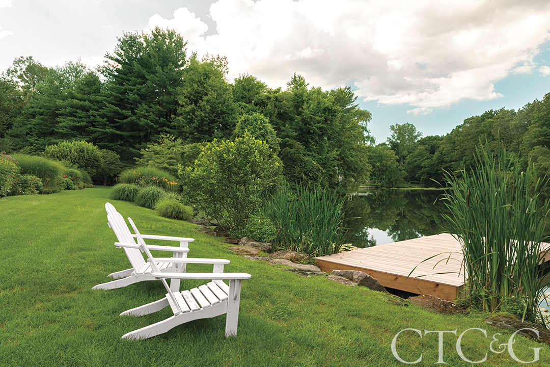 dock and outdoor sitting area overlooking water