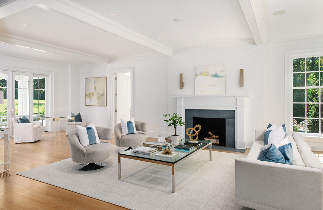 white colonial with black details estate living room