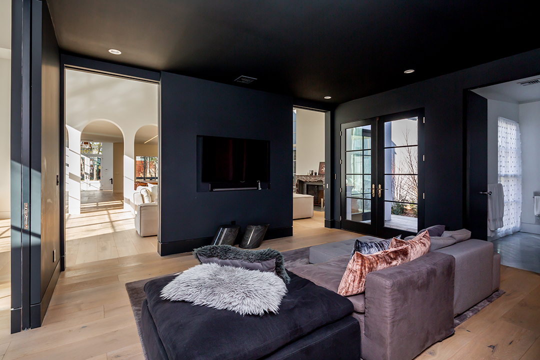 modern and minimalistic dark media space