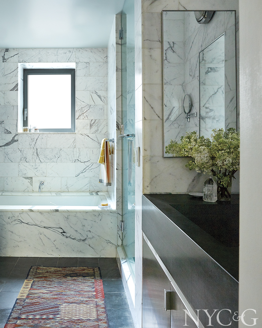 Eclectic Flatiron Apartment white marble Bathroom