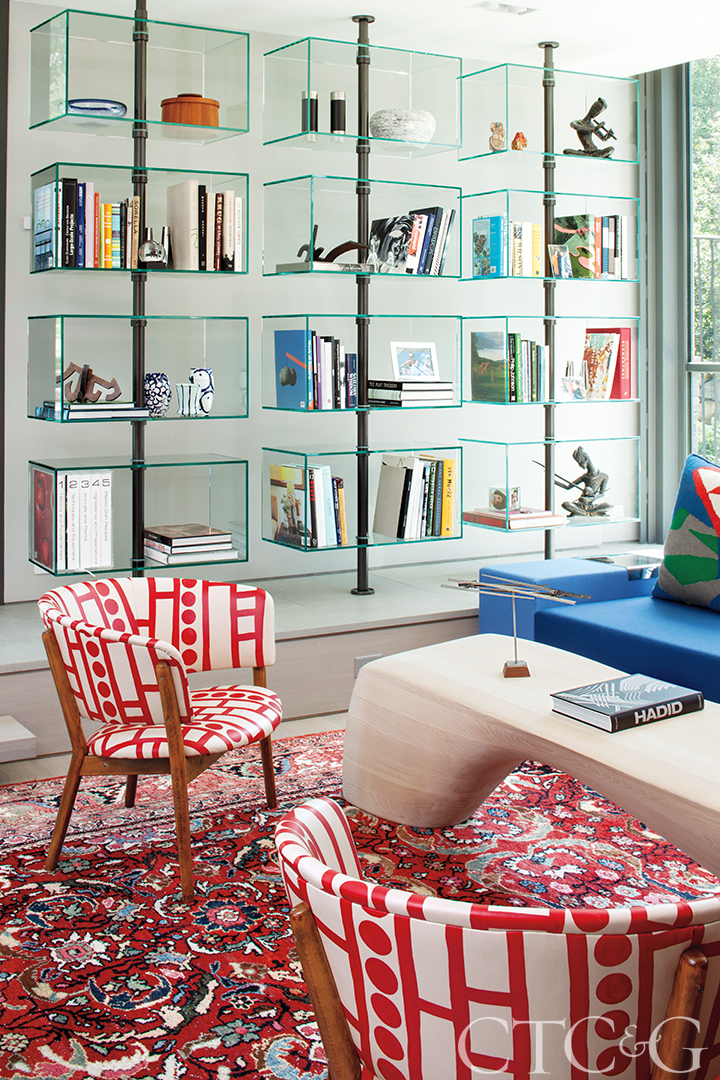 Innovative Seating area with glass shelving