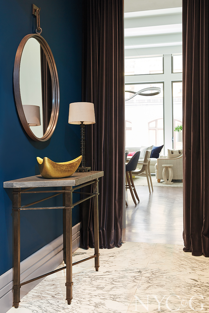 modern blue foyer and side table