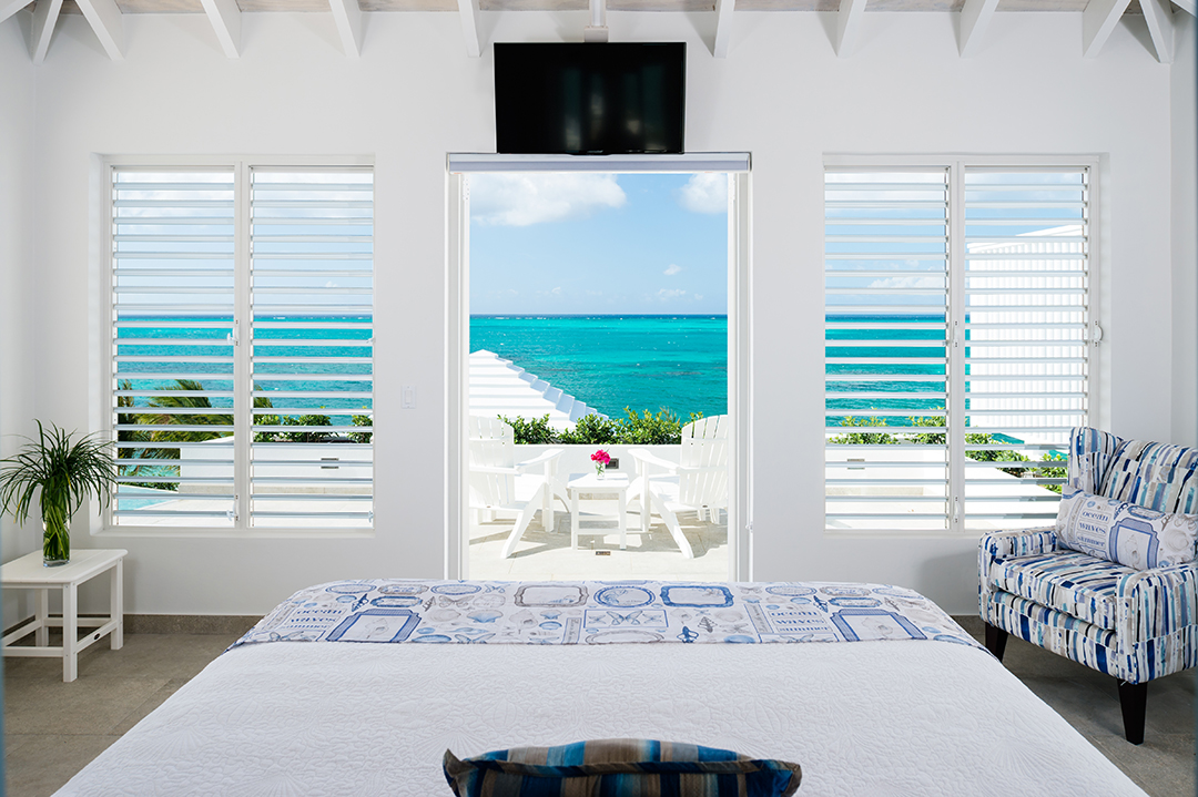 Oceanfront Turks and Caicos Villa Master Bedroom and Terrace