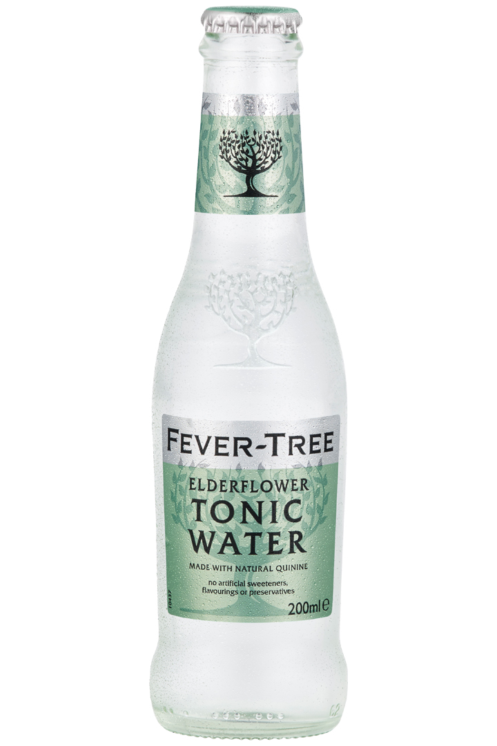 A clear bottle of gin with a green label.
