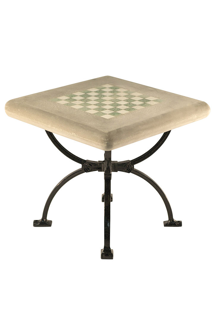 Concrete square table with green and white chessboard.