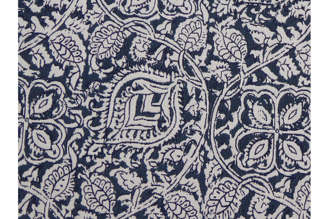 Navy blue and white patterned rug.