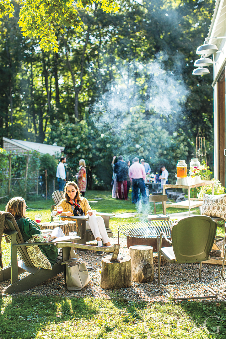 Guests Gathered At Dirt Road Farm Bonfire in Garden