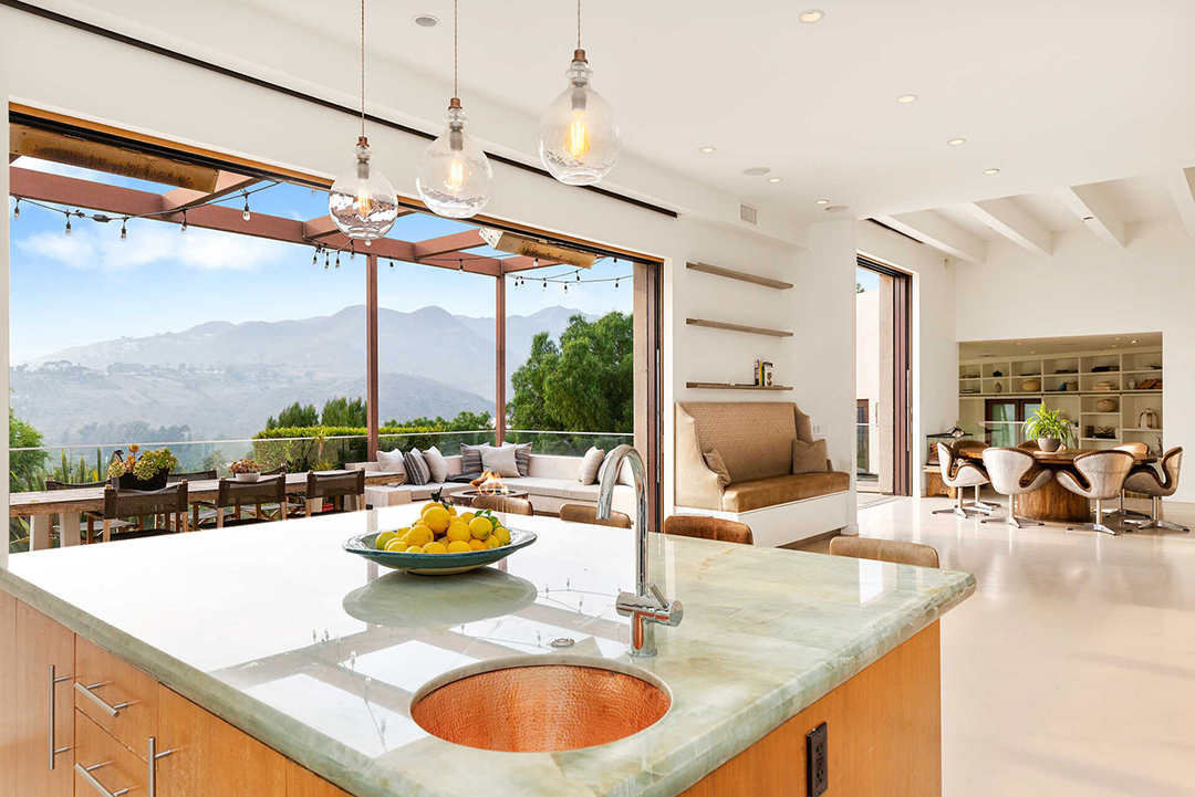 Hemsworth Brothers List Chic Malibu Retreat Where Outdoor Living Reigns Kitchen View