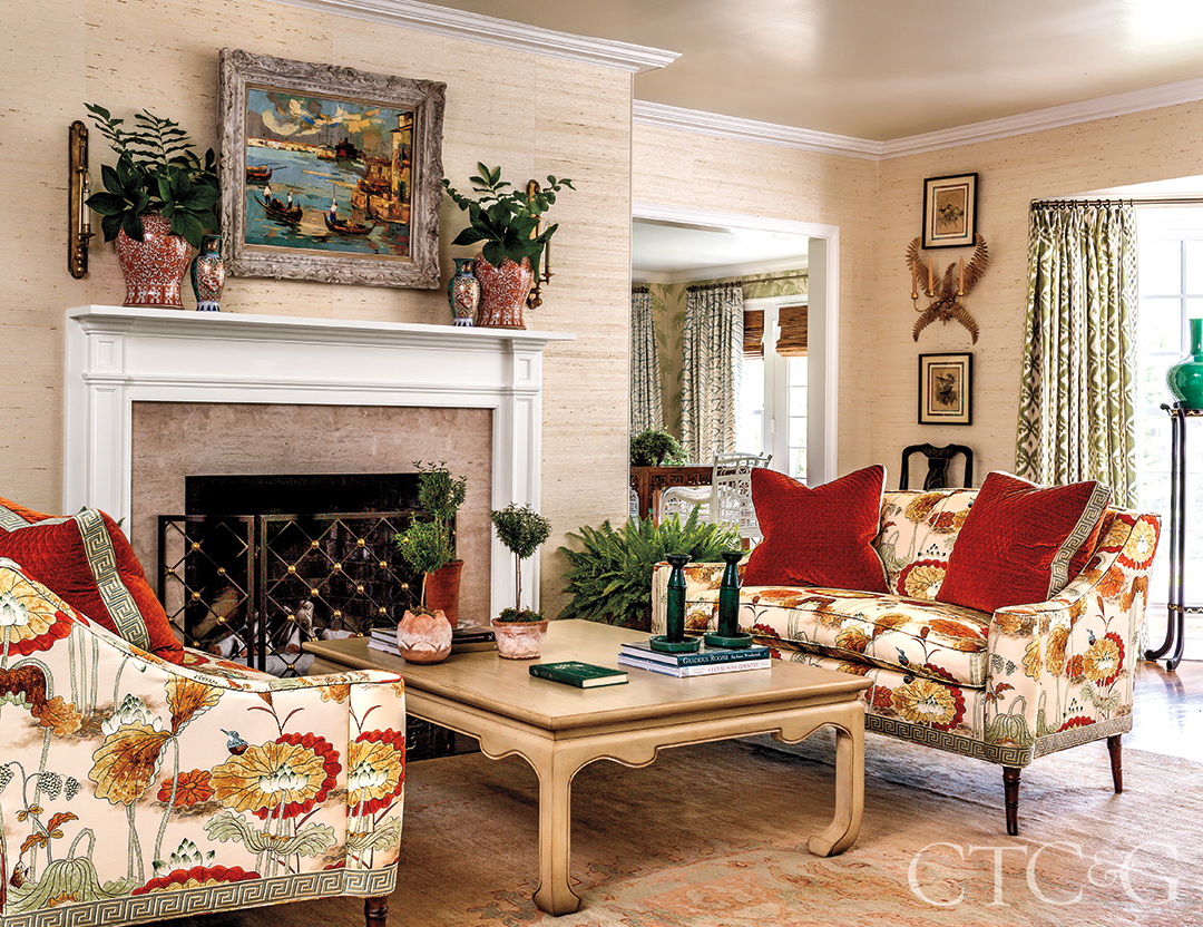 Southern-style living room with red velvet pillows