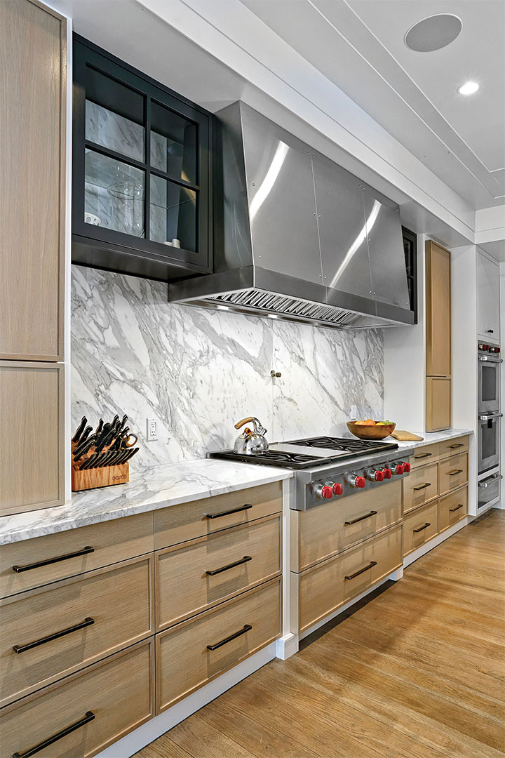 Tour A Modern Tudor Style Home Designed With Stone In Mind 10
