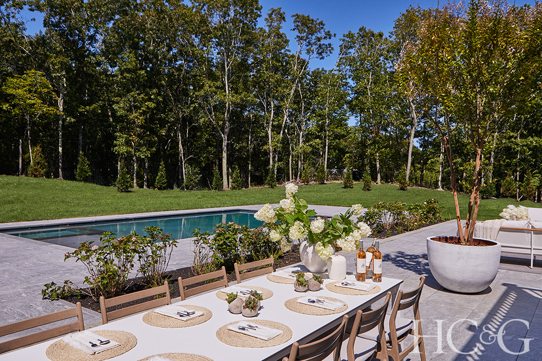 outdoor pool and dinner table