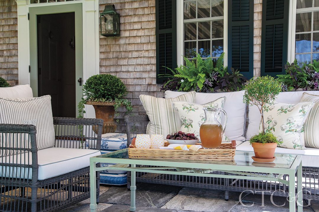 shingle style home outdoor seating area