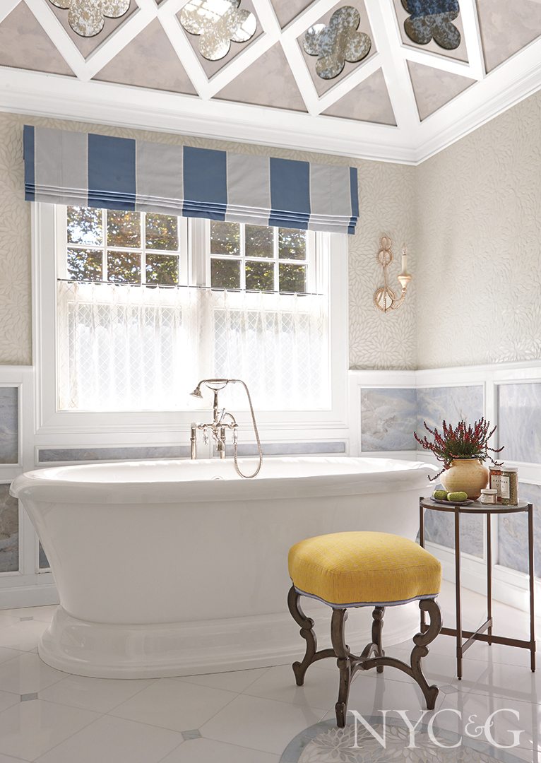 Free Standing Tub In Blue And White Bathroom