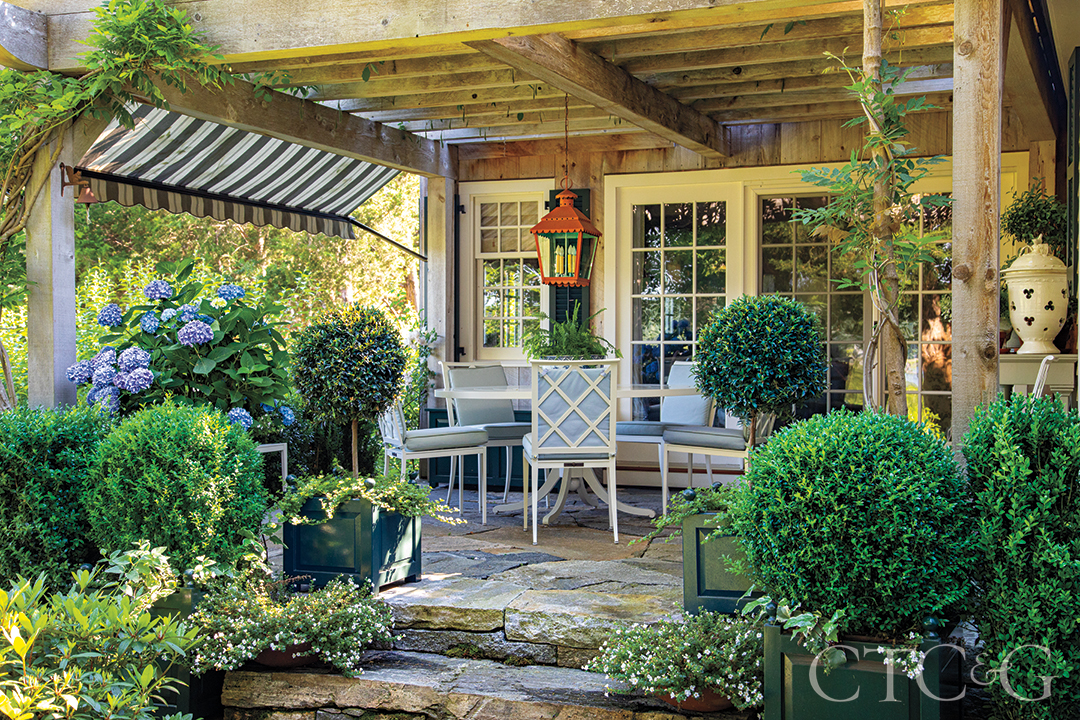 outdoor stone patio with awning