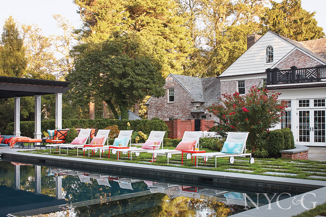 Outdoor Pool With White Lounge Chairs