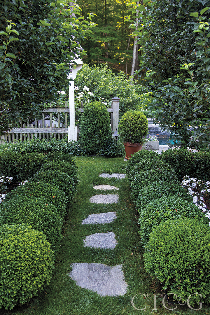 stone path leading to outdoor pool