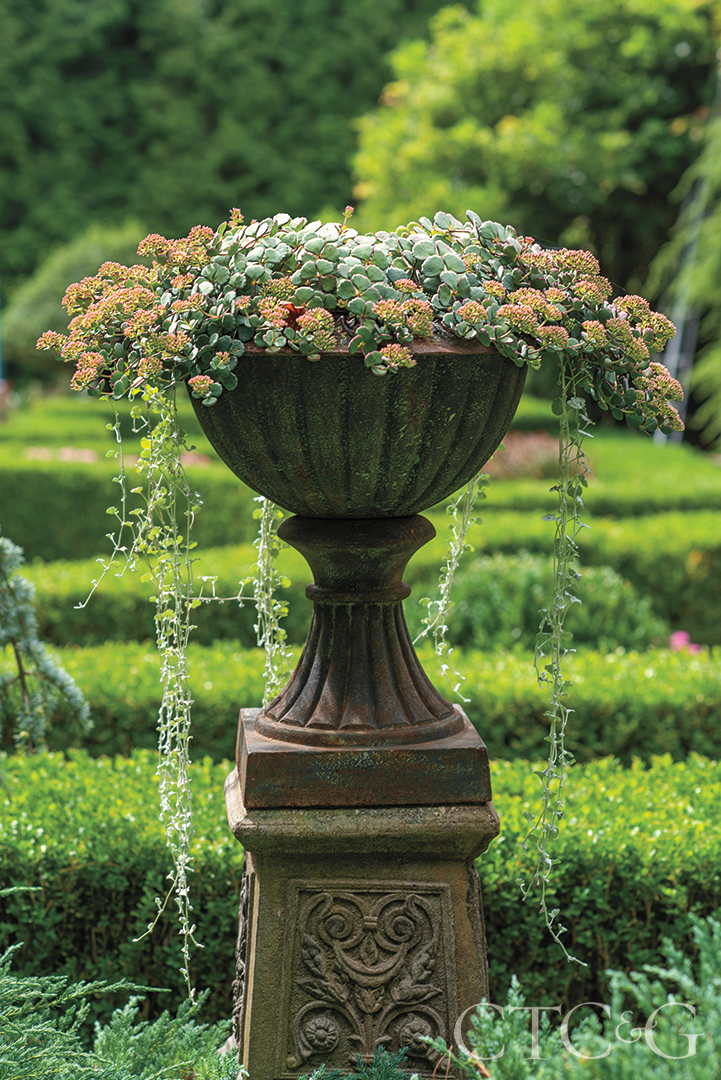 antique cast iron with urns