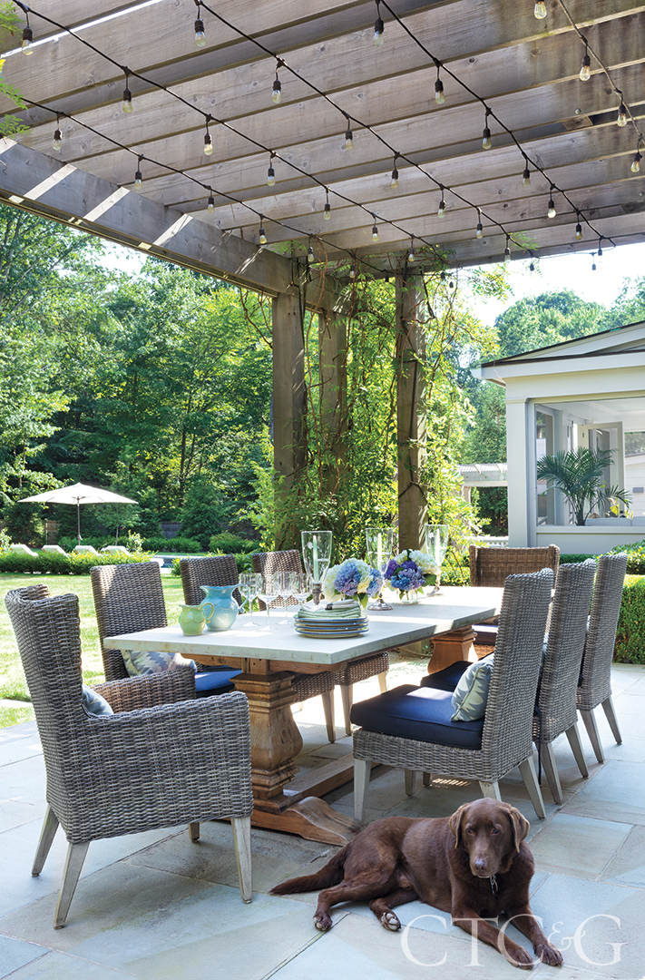 outdoor dining table with weather faux-wicker chairs