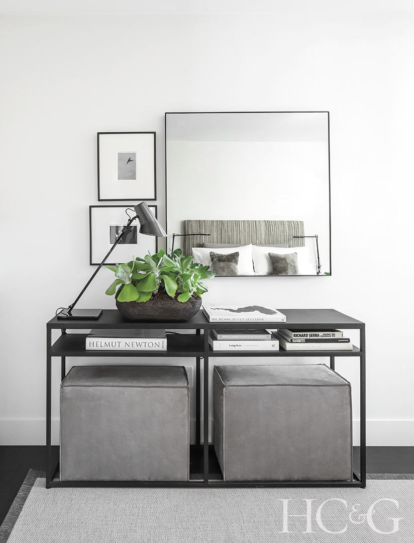 mirror and decor in guest room; neutral color scheme