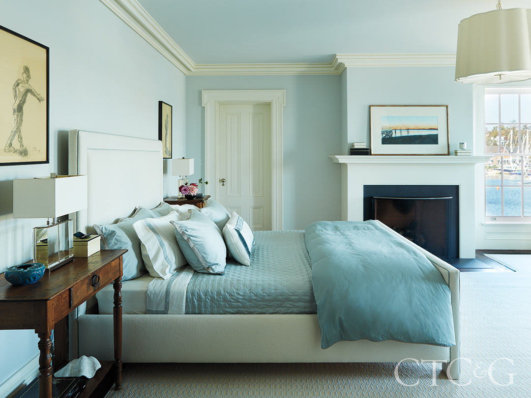 Fireplace And King Bed In Master Bedroom