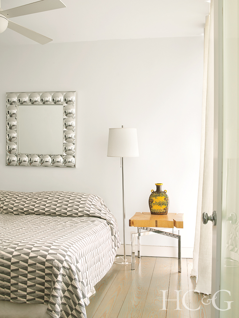 Minimalist Bedroom with Lamp and Nightstand and Bed